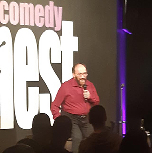 Michael performing comedy at Comedy Nest in Montreal.